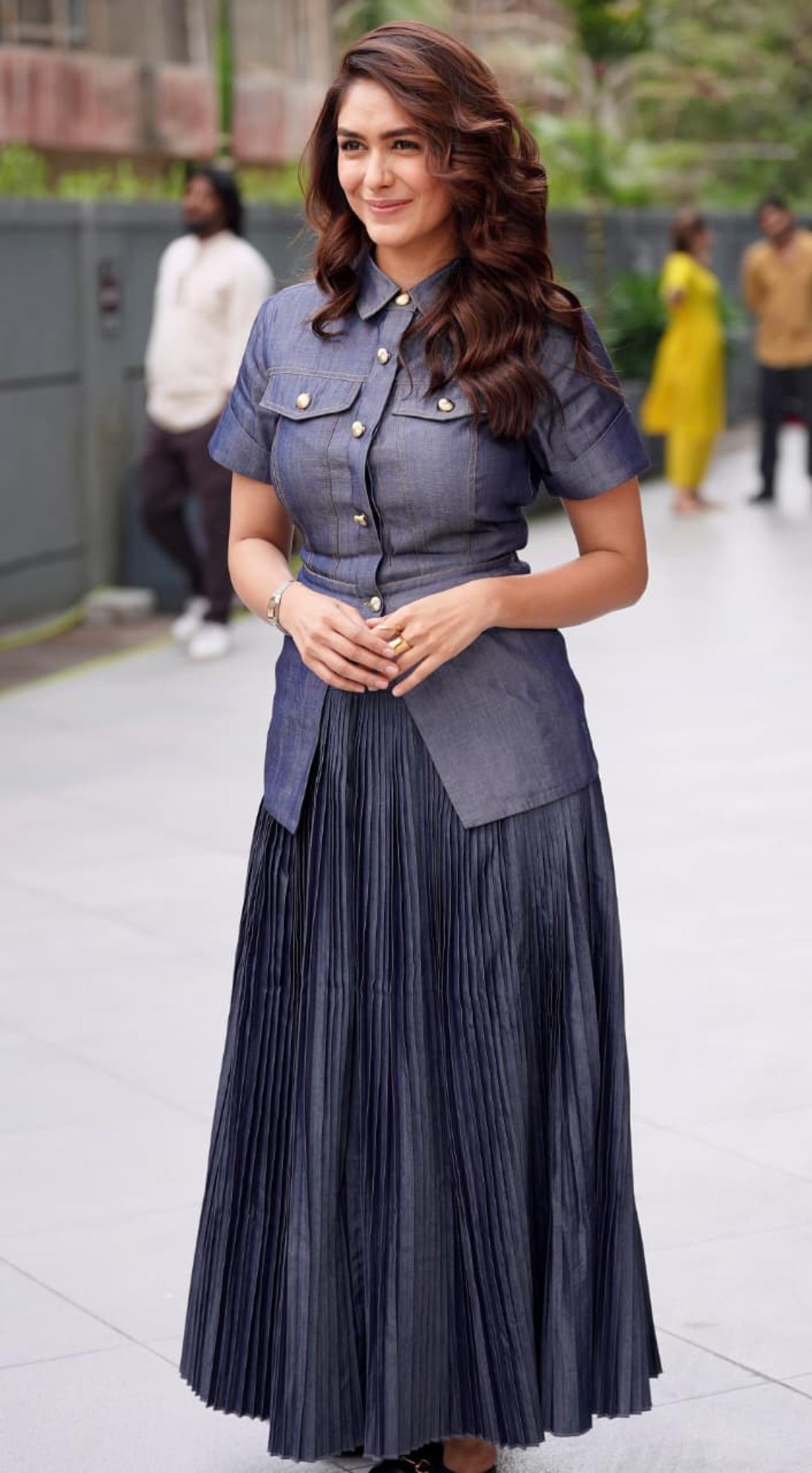 Mrunal Thakur steps out in a clean denim look for Dacoit promotions, serving a sharp style with a powerful presence.